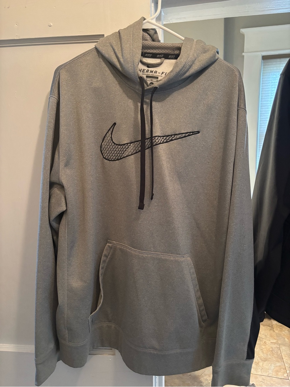 Nike Men's Gray Pullover Hoodie with Black Swoosh